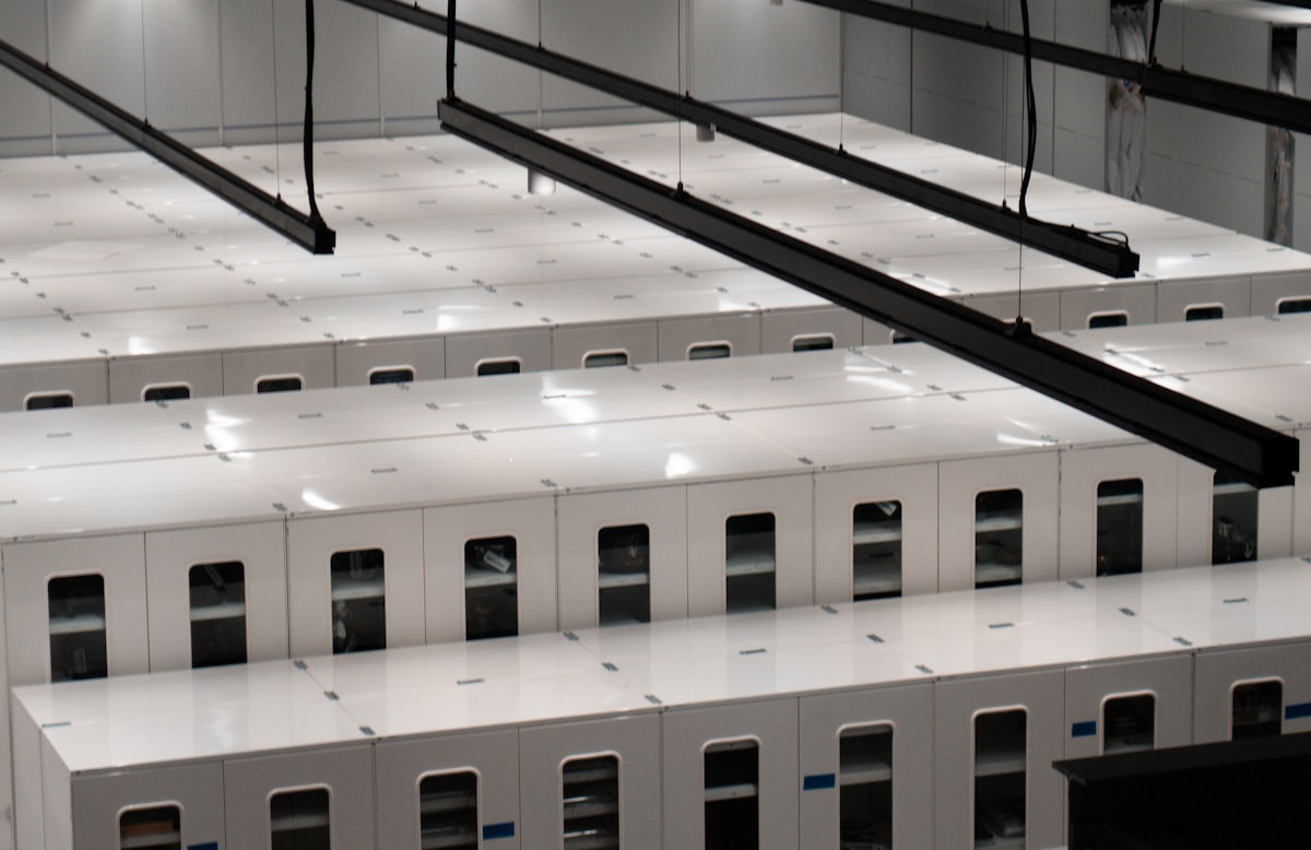 Rows of server cabinets in a modern data centre