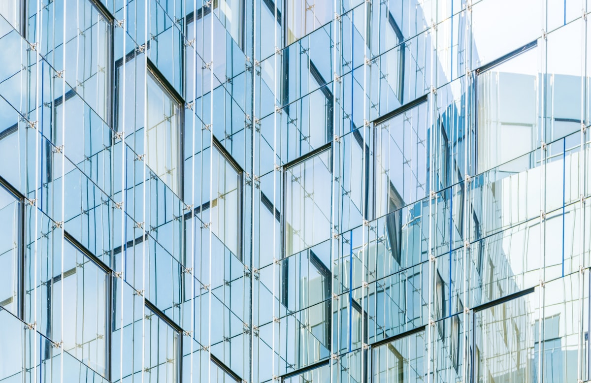 Detail of a modern blue glass office facade